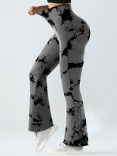 side view yoga asana in spectraflow bootcut leggings dark gray