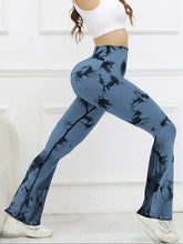  back angle aerobic movement in spectraflow bootcut leggings light blue
