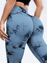 close up back view of spectraflow bootcut leggings light blue highlighting fabric texture