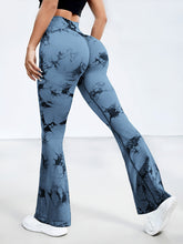 side view yoga asana in spectraflow bootcut leggings light blue