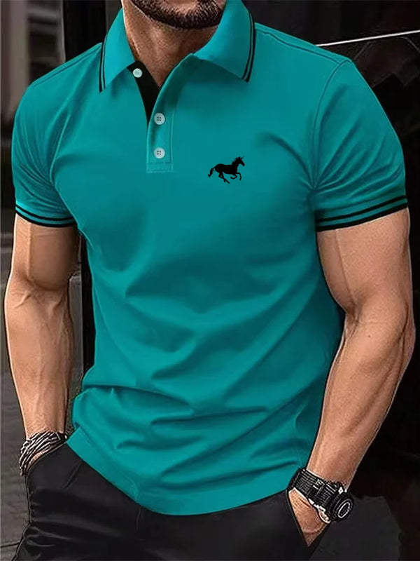 Model wearing dark turquoise Stallion Crest Luxe Polo with black trim collar and stallion logo