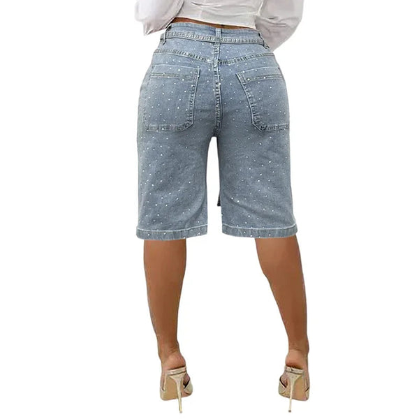 Back view of Stigende LuxeGlow light blue rhinestone denim shorts showing pocket and fit.