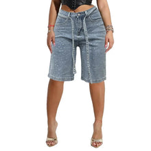 Front view of Stigende LuxeGlow light blue rhinestone sequin denim shorts.