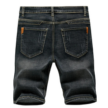 Stonecraft Flex dark medium jean shorts back view showcasing pockets.
