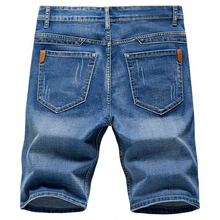 Stonecraft Flex  Medium Blue Denim Shorts back view showcasing pockets.