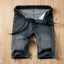 Stonecraft Flex Dusty Dark Blue Denim Shorts front view in washed denim.