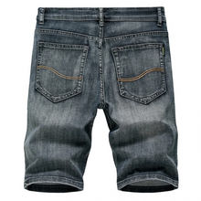 Stonecraft Flex dark dusty blue jean shorts back view showcasing pockets.