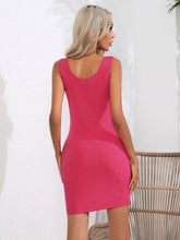 Model back view showcasing the strawberry Curvalicious Allure Bodycon Mini Dress with adjustable straps and curve-hugging fit.