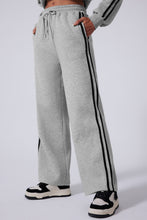 close up of light gray striva twinset wide leg pants fabric and stripe