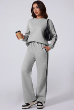 striva twinset light gray front view styled with white top sneakers