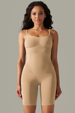 Tan spaghetti strap active romper front view with curve-hugging fit and supportive thick straps.