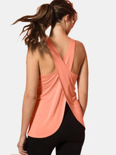 Crisscross back design on tank top in Coral.