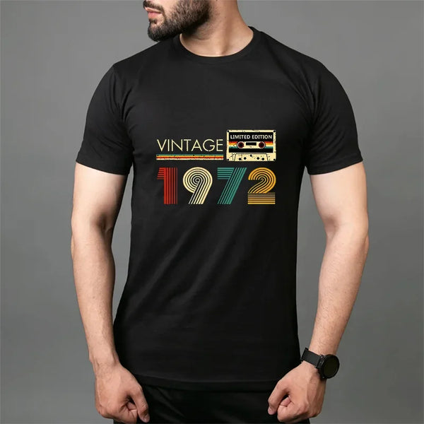 Model wearing TapeWave Black 1972 Retro Graphic Tee front view.