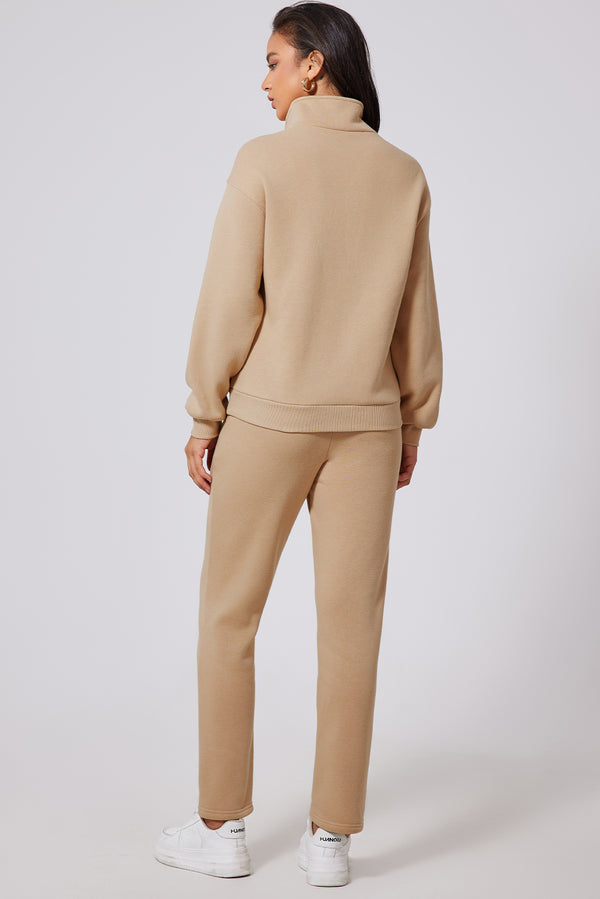 Back view of Dust Storm TerraSync set showing relaxed silhouette and pants fit.