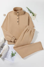 Flat lay of Dust Storm TerraSync HalfSnap Active Set front view, paired with white sneakers and minimal accessories for a sporty-chic look.