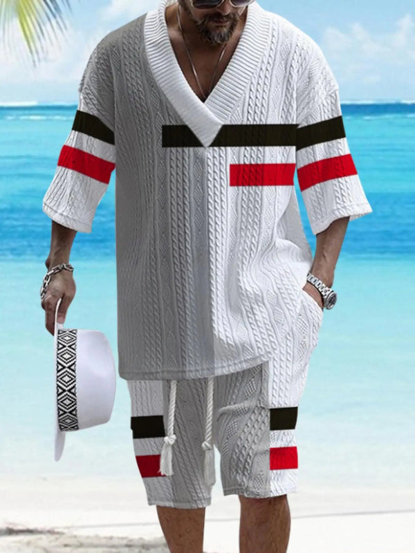Model wearing Valverro StriLux Set beachside, showing full front design and bold stripes.
