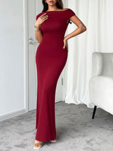 Burgundy Vareliya Ruched Maxi Dress styled for cocktail event with clutch bag and strappy sandals.