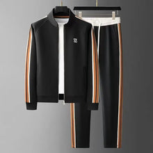 Front hanger display of Varnox LuxeTrak black jacket and pants.