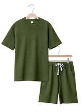 Army green textured set front view on hanger