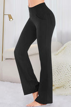 side view phone in pocket in velapocket flare pants black