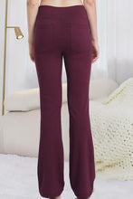 close-up back view of velapocket flare pants burgundy