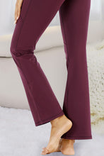 close up of bottom leg hem on burgundy velapocket pants