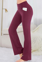 side view phone in pocket in velapocket flare pants burgundy