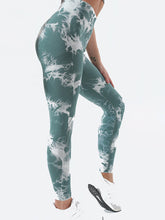 right side studio view wearing veloraform leggings deep teal