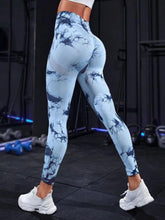 back view weight lifting at gym workout in veloraform leggings navy blue white