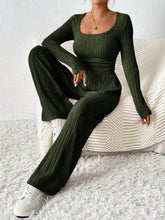 Verdelle Scoop Wide Leg Lounge Duo in army green seated lounging on the couch
