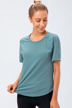 Verzana Active Tee in teal — front view with raglan sleeves.
