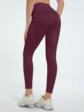 back view of virexaform sculpt leggings in burgundy