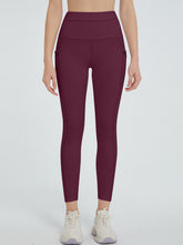 front view of virexaform sculpt leggings in burgundy