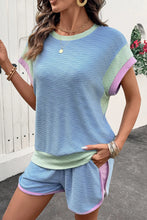 Side profile of Vivenza Luxe™ Top and Shorts with pockets.