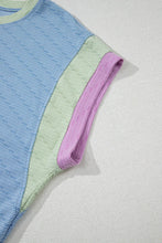 Close-up view of the Vivenza Luxe™ Contrast Set's sleeve trim detailing.