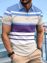 Model wearing pacific blue VividStripes Luxe Polo featuring vibrant stripes and button placket