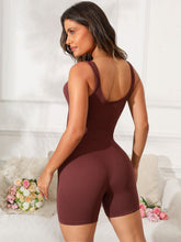 Back view of dark brown Vyvenca SculptFit Active Romper, showcasing wide straps and seamless fit.