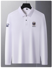Front view of white Equestrian Crest Designer Polo on hanger.