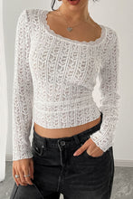 Model wearing a white lace detail long sleeve T-shirt with delicate trim at the neckline and cuffs, available in sizes S to 2XL.