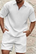 White Azryl WaffleZip Luxe Set front view, hands in pockets.