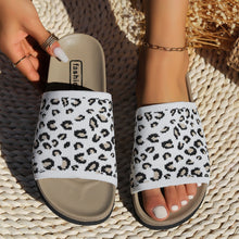 Model wearing white Leopard Open Toe Sandals, top front view