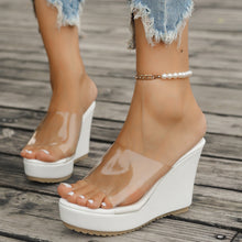 Model wearing white open toe Wedge Sandals paired with a white pearl bracelet