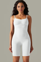 White spaghetti strap active romper front view with curve-hugging fit and supportive thick straps.