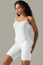 Side profile of white active romper with high-stretch fabric and sculpting fit.