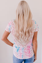 Back view of Wild Fusion Leopard V-Neck Tee with multicolor leopard pattern