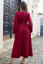 Back photo of Wine Zeleviane Pleated Maxi Dress, showing elegant pleats and luxe long sleeve styling.