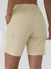 Back view of women's  khaki lightweight cargo shorts with drawstring waist.