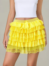 Yellow LacéraBloom Women’s Ruffle Lace Bow Shorts featuring lace layers and high-waist bow, model front view.