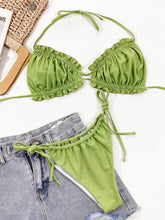 Yellow-green frill trim halter neck bikini set front flat lay view