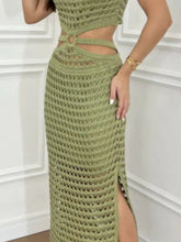 Close-up shot of stomach cutout and slit hem on sage Zalithé™ Dress, capturing soft knit detail.
